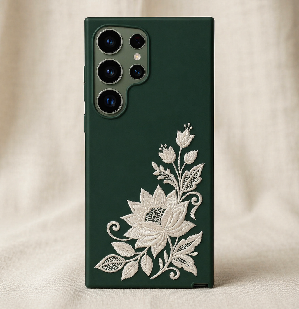 Dark green phone case with white floral design on a beige background